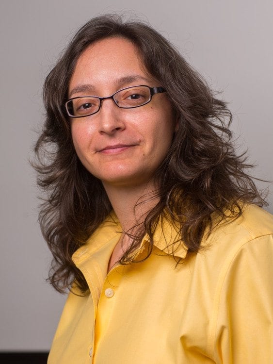 maria bulzacchelli professional headshot yellow shirt