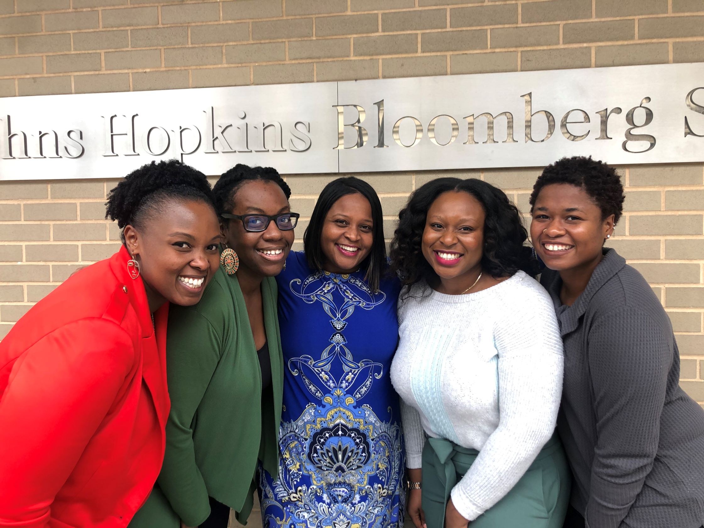 Dr, Terri Powell, center, poses with her Better Together team of graduate students.