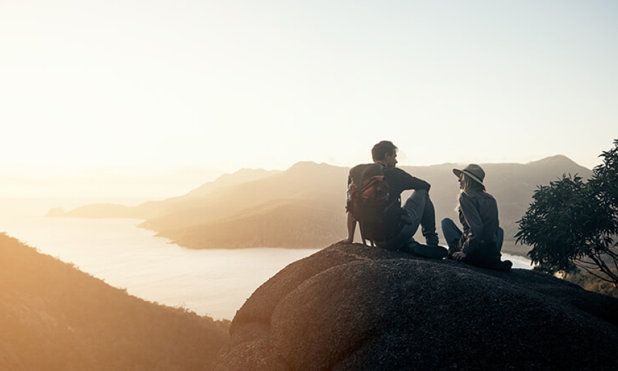 Scenic photo of two people hiking