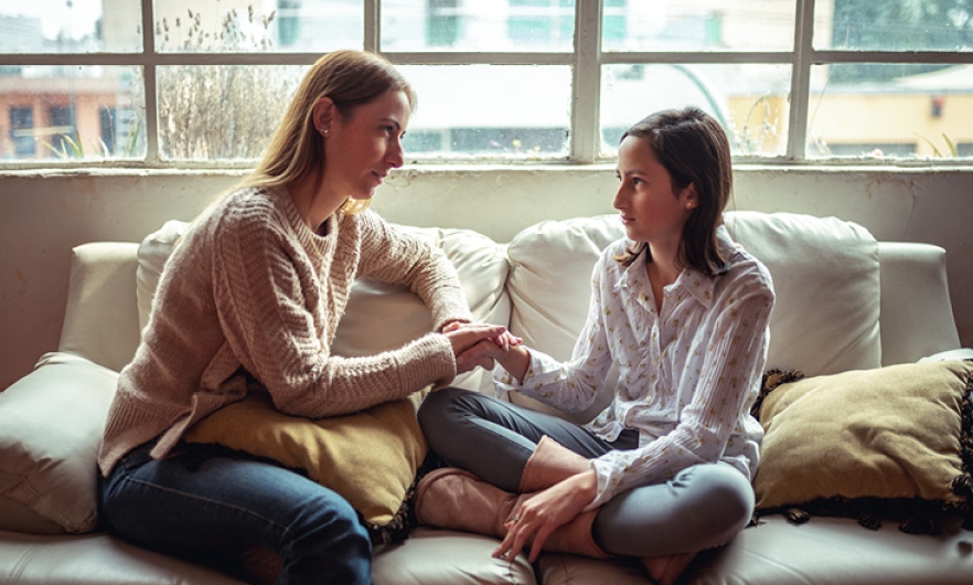 Two women talking