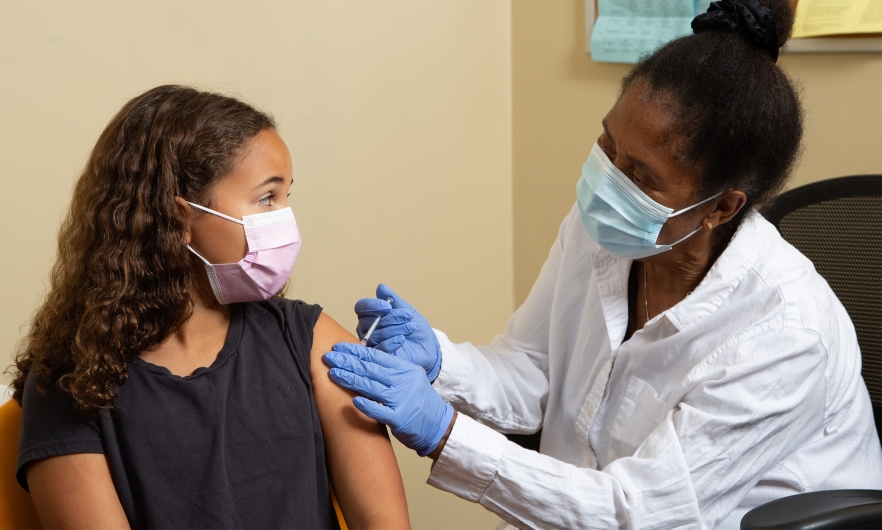 Child receiving vaccine