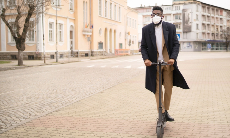 Young Black man on an e-scooter