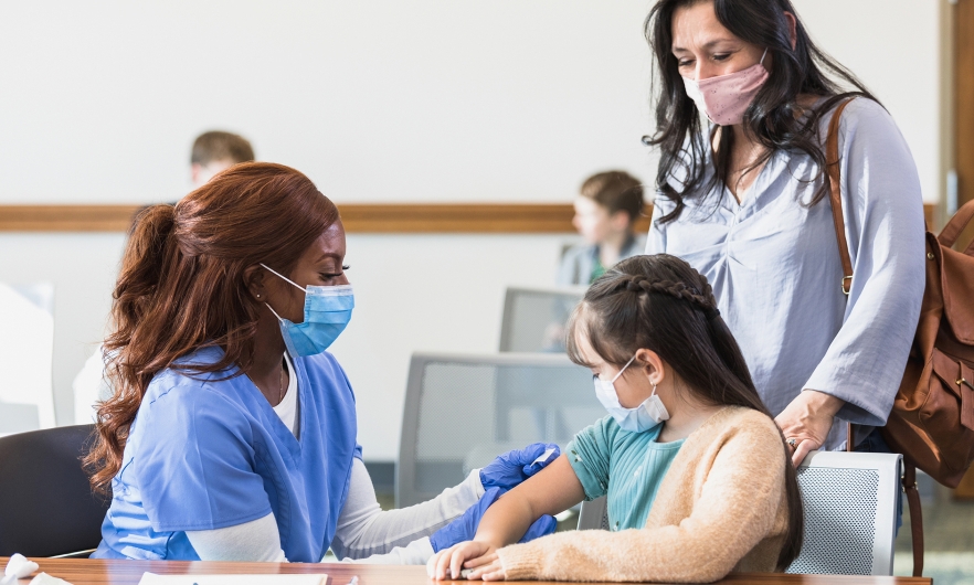 child getting vaccinated