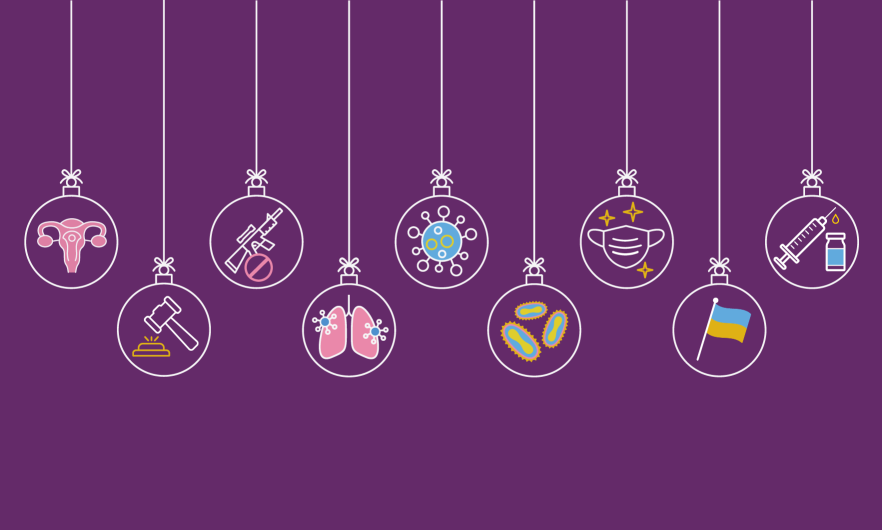 Purple background with holiday ornaments hanging