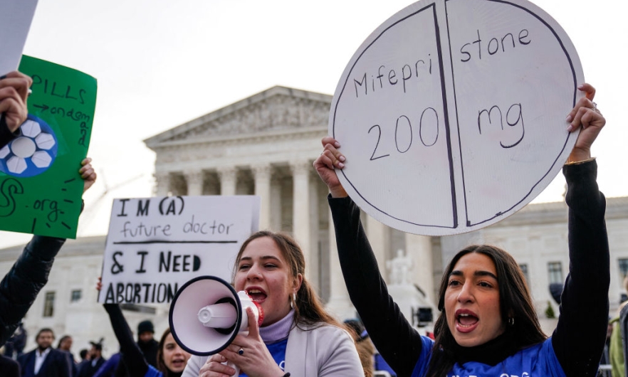 Abortion rights supporters rally in front of the U.S. Supreme Court on March 26, when the court began hearing arguments on access to the drug mifepristone.