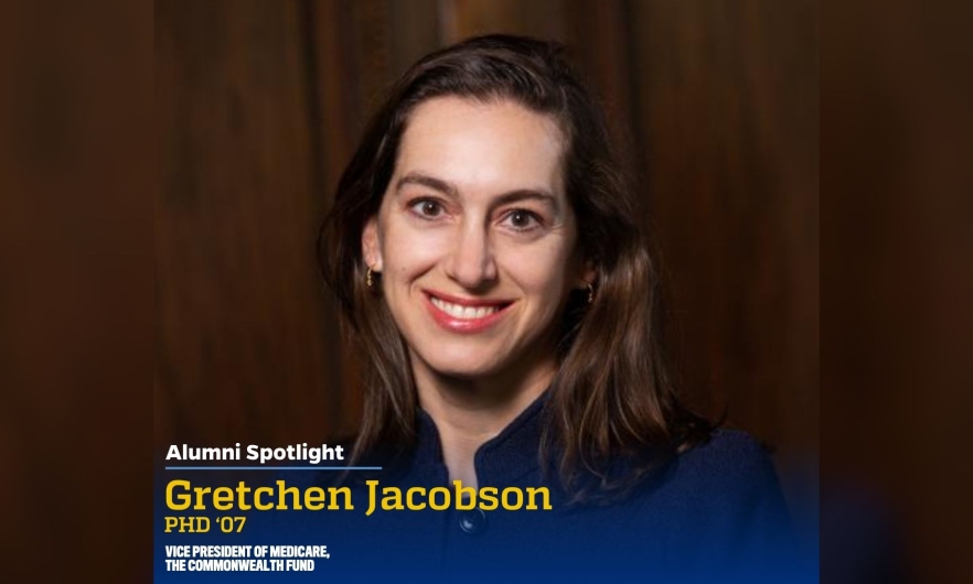 A headshot of a woman wearing a collared shirt