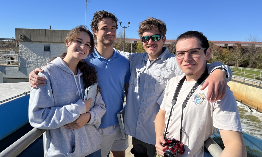 group shot of one young female and four young males