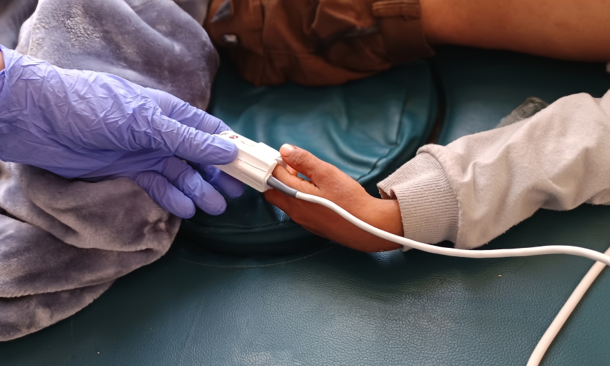 A nurse records vital signs for a measles patient in the Médecins Sans Frontières isolation ward. at Al-Wahda hospital, Dhamar, Yemen. May 27, 2025.