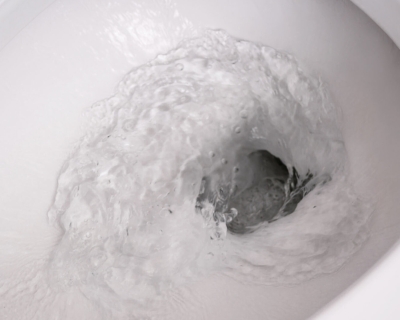 water being flushed down the toilet