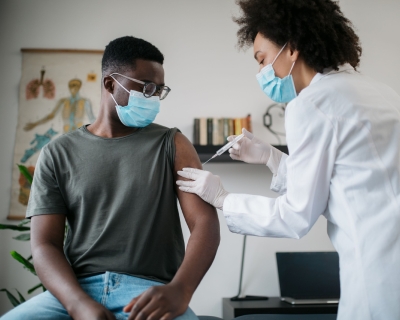 Patient receiving a vaccine at the doctor's office