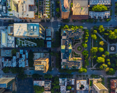 birds-eye view of city buildings and a park