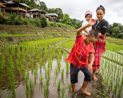 Mother with children in rural camp