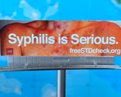 billboard stating that syphilis is serious