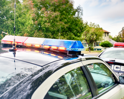 photo of two police cars 