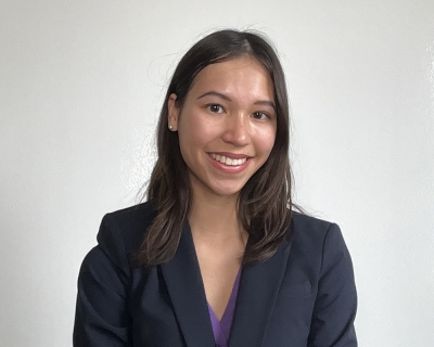head shot of a woman with long brown hair