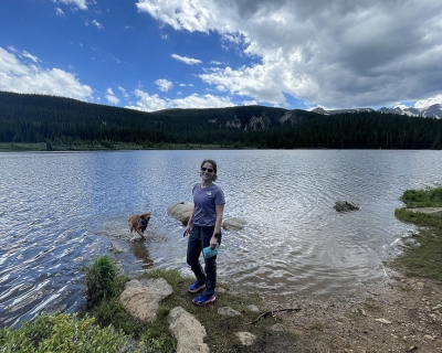 woman standing near body of water