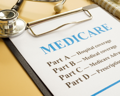 A sheet of paper that's titled Medicare and attached to a clipboard