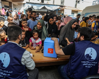 A child is vaccinated during the polio vaccination campaign in Deir al Balah, Gaza, on September 1, 2024.