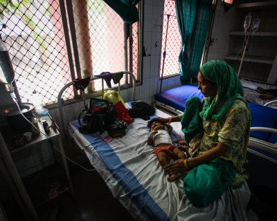 Sahil, a 7-month-old child suffering from diarrhea, lies in a bed at the district hospital on May 21, 2022 in Mirzapur, Uttar Pradesh, India.
