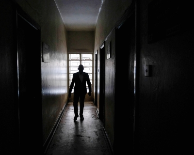Kruish Mubiru, executive director of Uganda Young Positives, walks amid the organization&#039;s empty facilities, on February 12, 2025, in Kampala, Uganda. 