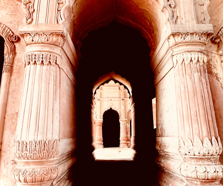 A photographic capture of ornate Mughal architecture at the entrance to the Bara Imambara complex in Lucknow, UP