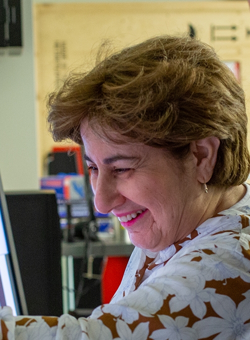 people looking at a computer screen