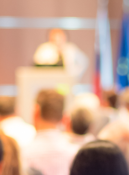 speaker in front of an audience