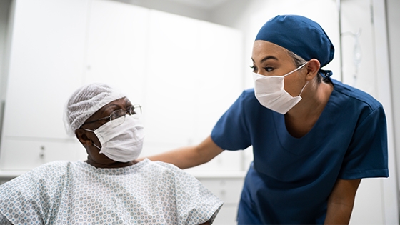 medical professional consoling a patient