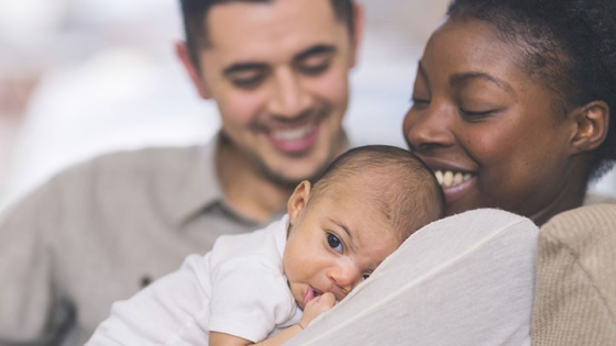 man and woman with child