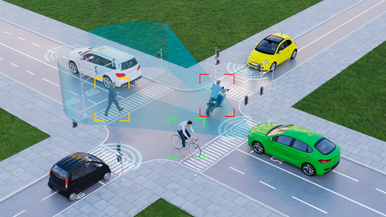 four way intersection with cars and pedestrians