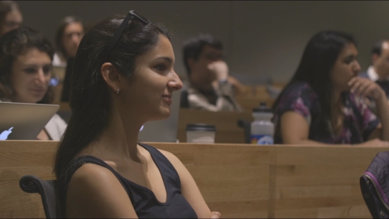 JHSPH graduate student attends a lecture.