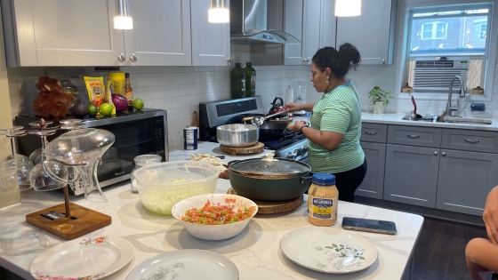 Community member gibes cooking demo as part of YAB Granny Project