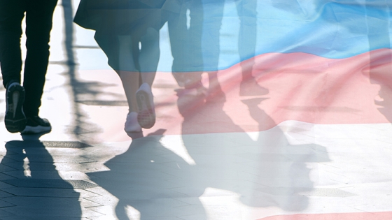 Trans Flag and Marchers