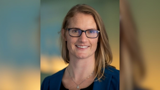 A headshot of a woman