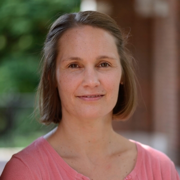 close up of woman smiling standing outdoors