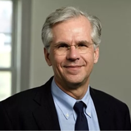 Portrait of older man wearing glasses, smiling