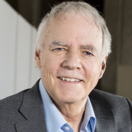 Portrait of older man with gray hair smiling