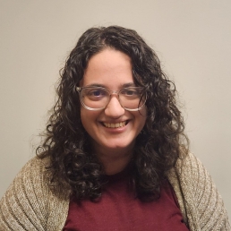 Talia Loeb Woman with glasses wearing a sweater