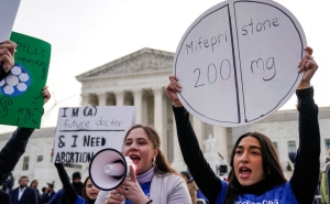 Abortion rights supporters rally in front of the U.S. Supreme Court on March 26, when the court began hearing arguments on access to the drug mifepristone.