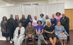 Techquity by FAITH group Group of men and women sitting and standing