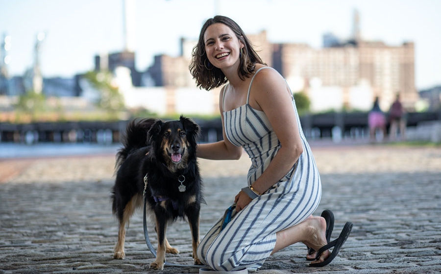 Student with her dog.