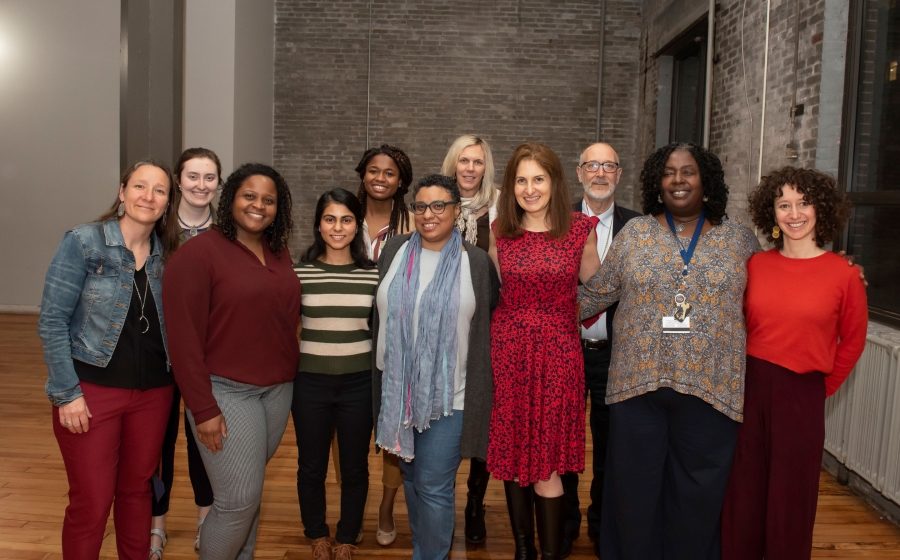 CAH Faculty and staff posing at CAH dinner