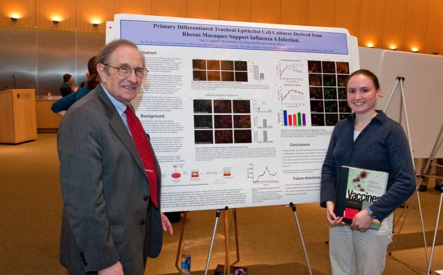 Photo of Dr. Plotkin and student poster contest first place winner and MMI PhD student Cailin Deal