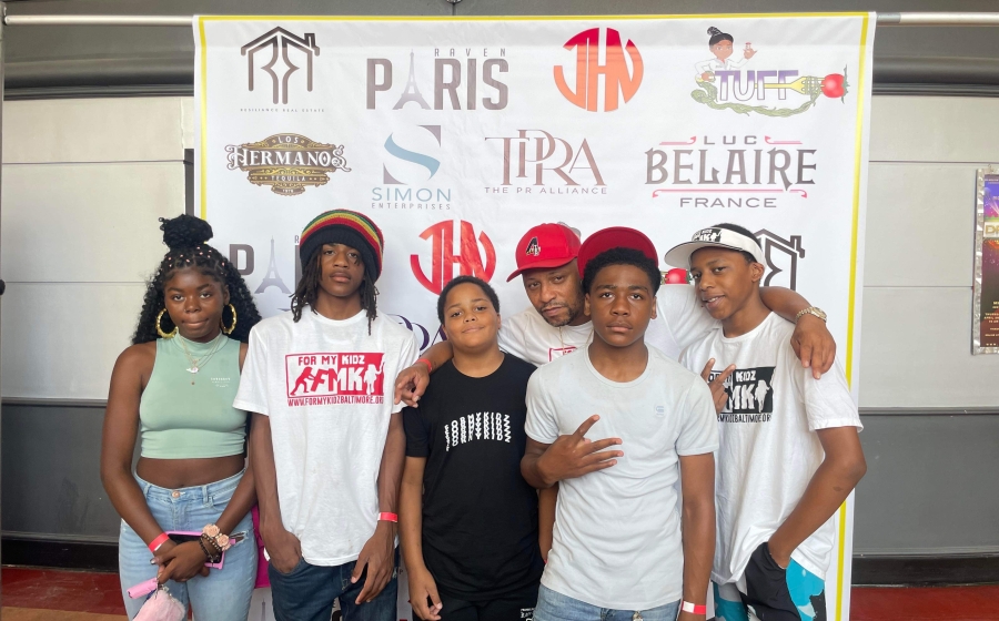 Jerel Wilson with five For My Kidz participants 