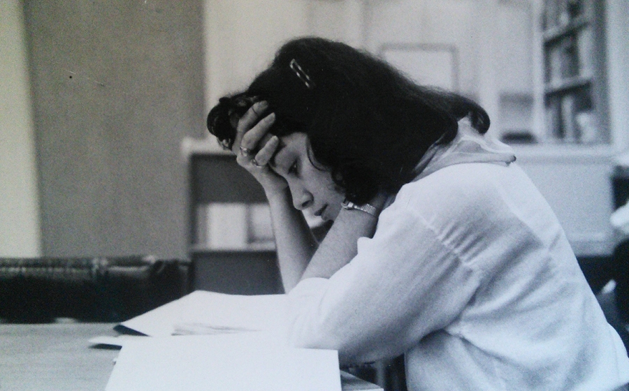 Gertrude Huster intently studying Huster, deep in her biostatistics studies, earned her master's in health sciences at the Bloomberg School.