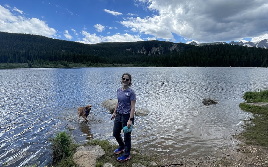 woman standing near body of water