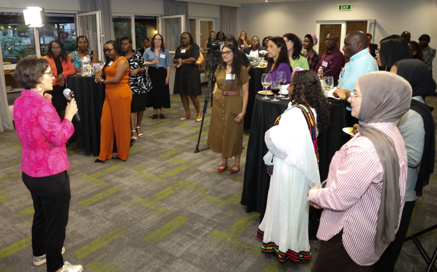 Dr. Michele Decker addressing participants at Center hosted reception.