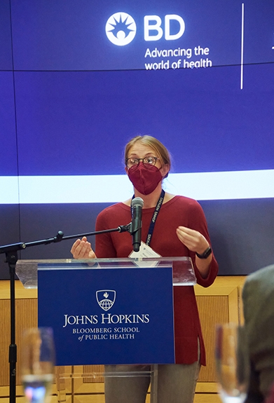 Megan Wood at BD event Megan Wood speaking at podium