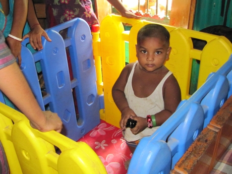 boy in playpen