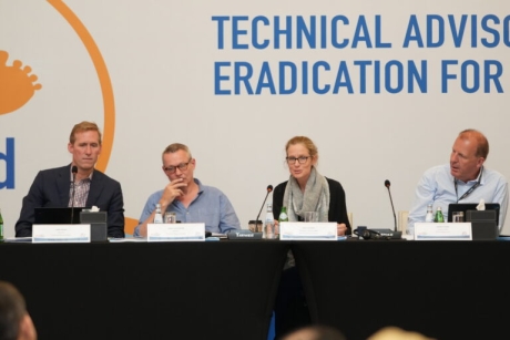 Svea seated at panel discussion at TAG meeting